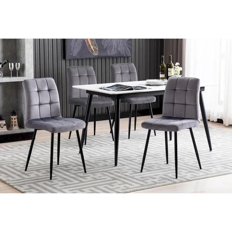 Chaise de salle à manger mi-siècle en velours rose capitonnée pieds en fer inclinés